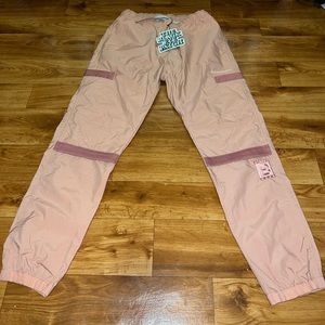 Black eye patch pink nylon cargo pants size small NWT